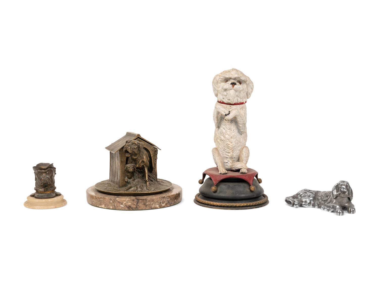A Collection of Four Dog-Themed Inkwells