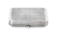 A Russian Silver Cigarette Case, Maker's mark AE, assay mark of Lev Oleks, Moscow, 1896, the lid and underside with reeded decoration.