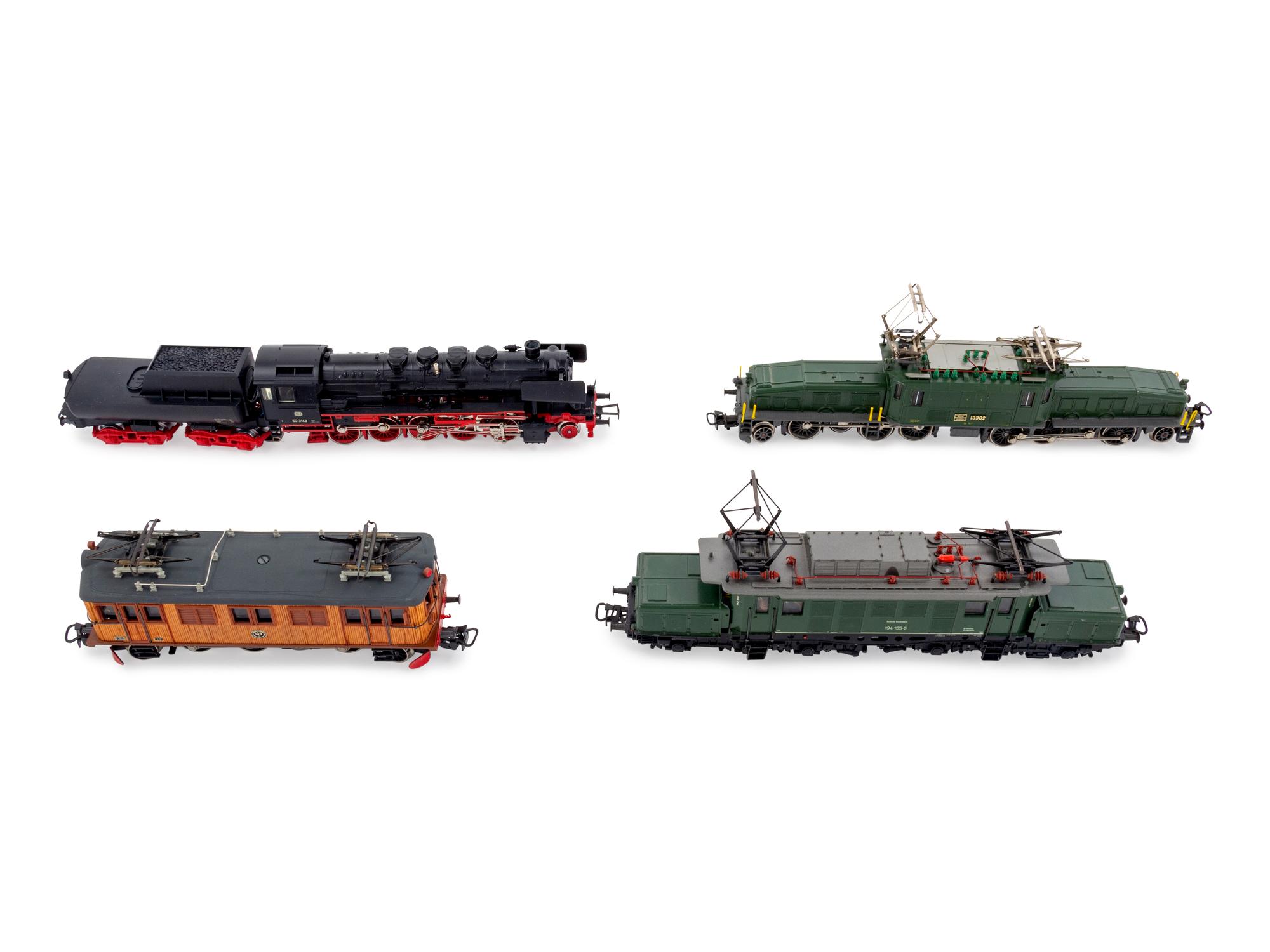 A Group of Four Factory Boxed Marklin HO-Gauge Locomotives