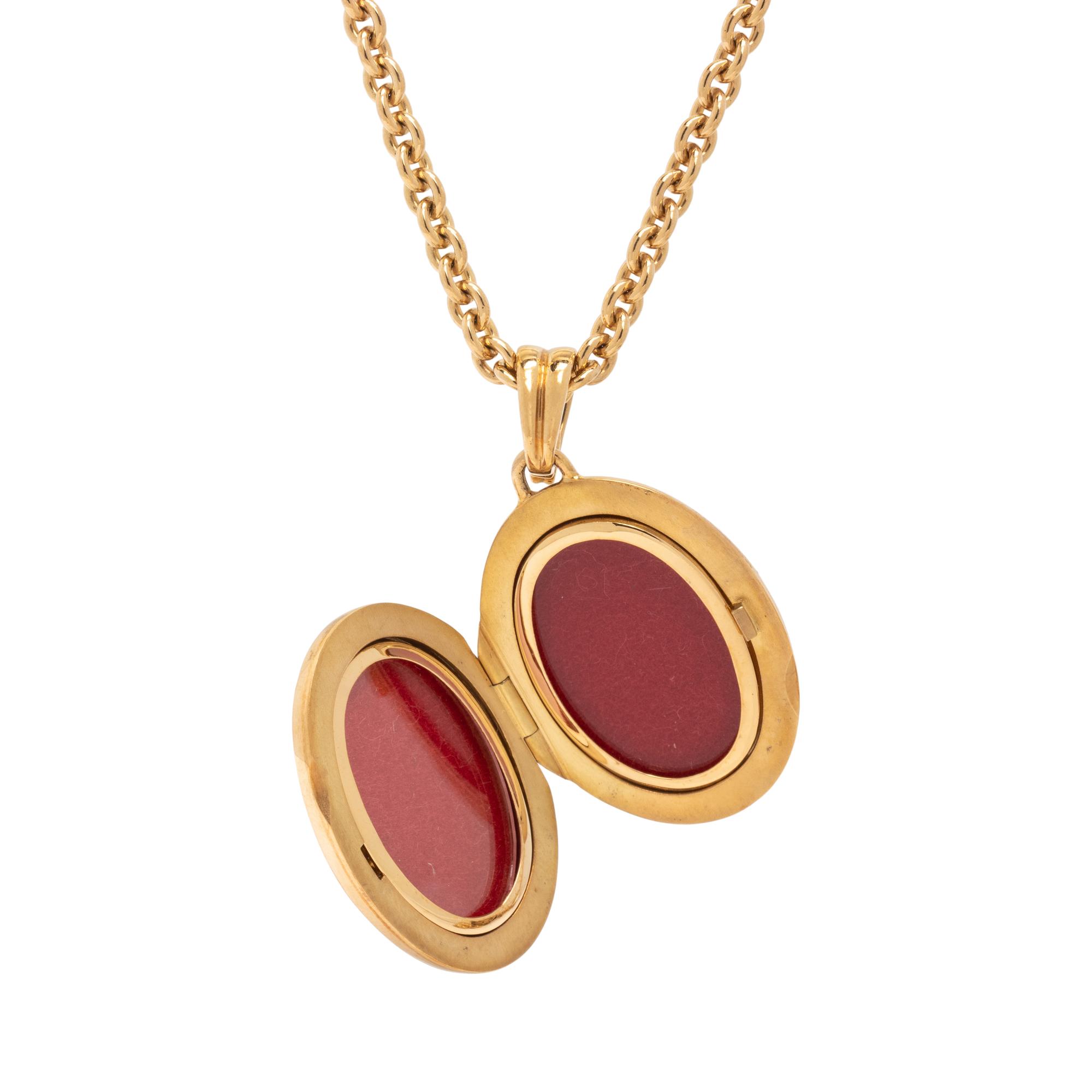 FABERGÉ, ENAMEL, DIAMOND, AND YELLOW GOLD LOCKET NECKLACE