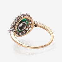 An Art Deco Gold, Diamond, and Emerald Ring