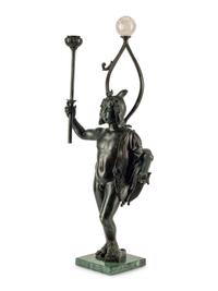 A Continental Patinated Bronze Figure with a Rock Crystal Ornament