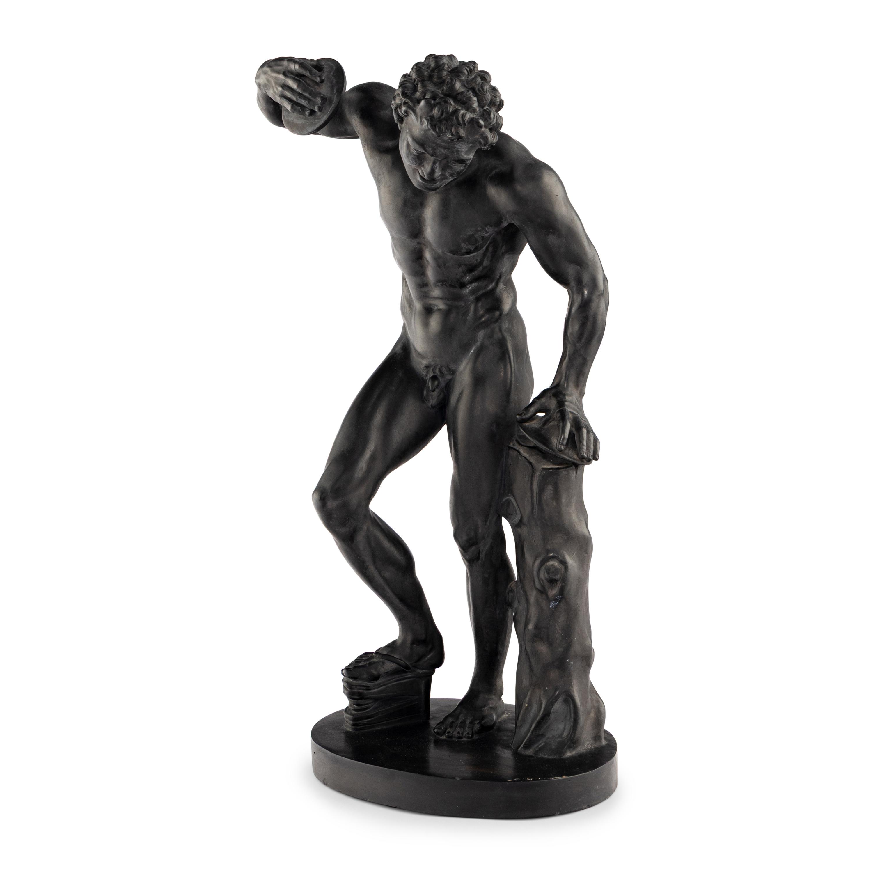 A Danish Black Ceramic Figure of a Dancing Faun