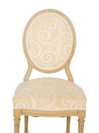 A Pair of Louis XVI Style Oval Back Painted Fauteuils and Matching Side Chair