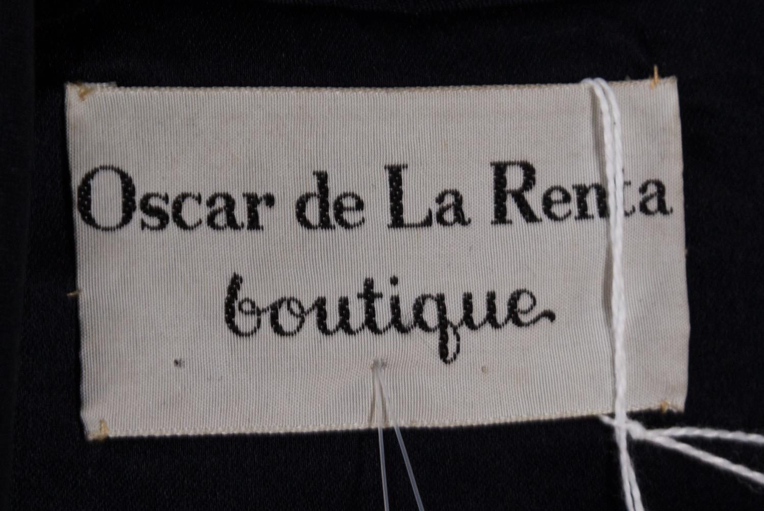 An Oscar de la Renta Black Silk Dress, Size 14.