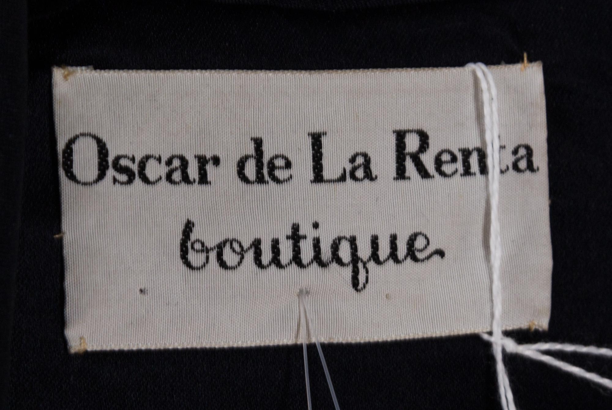An Oscar de la Renta Black Silk Dress, Size 14.