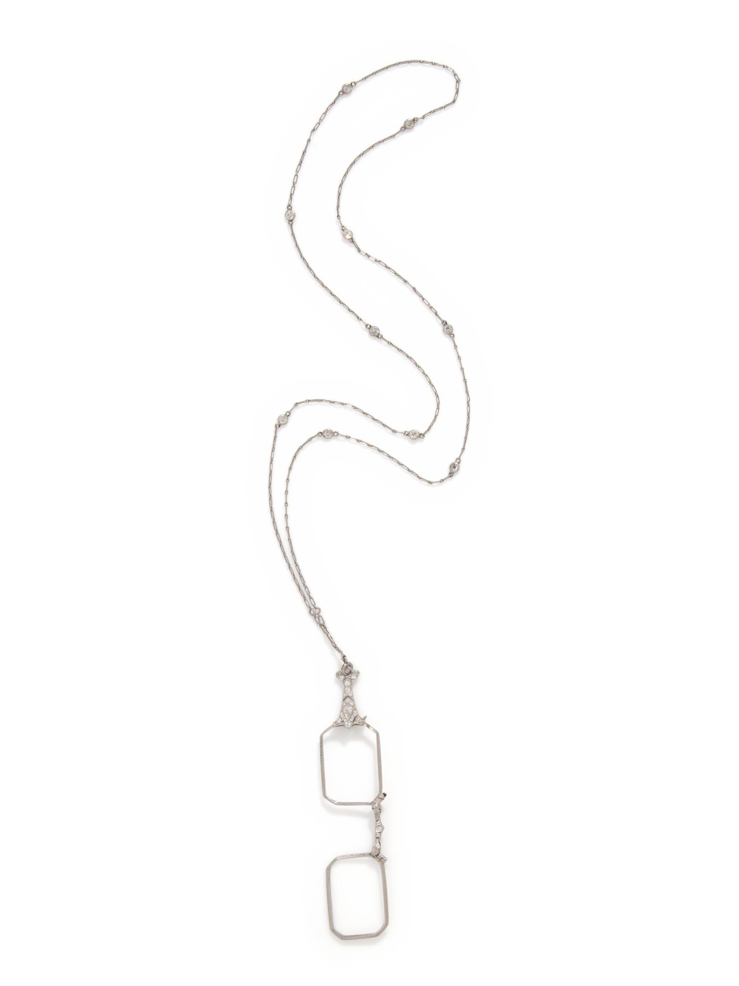 EDWARDIAN, DIAMOND AND PLATINUM LORGNETTE WITH DIAMOND COLLET CHAIN