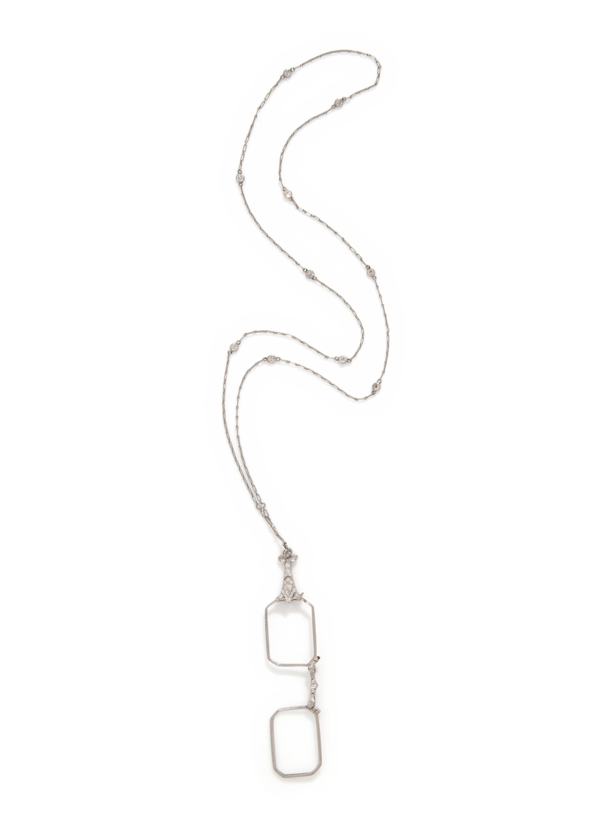EDWARDIAN, DIAMOND AND PLATINUM LORGNETTE WITH DIAMOND COLLET CHAIN