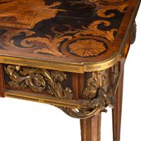 A Louis XVI Style Marquetry and Gilt Bronze Mounted Occasional Table