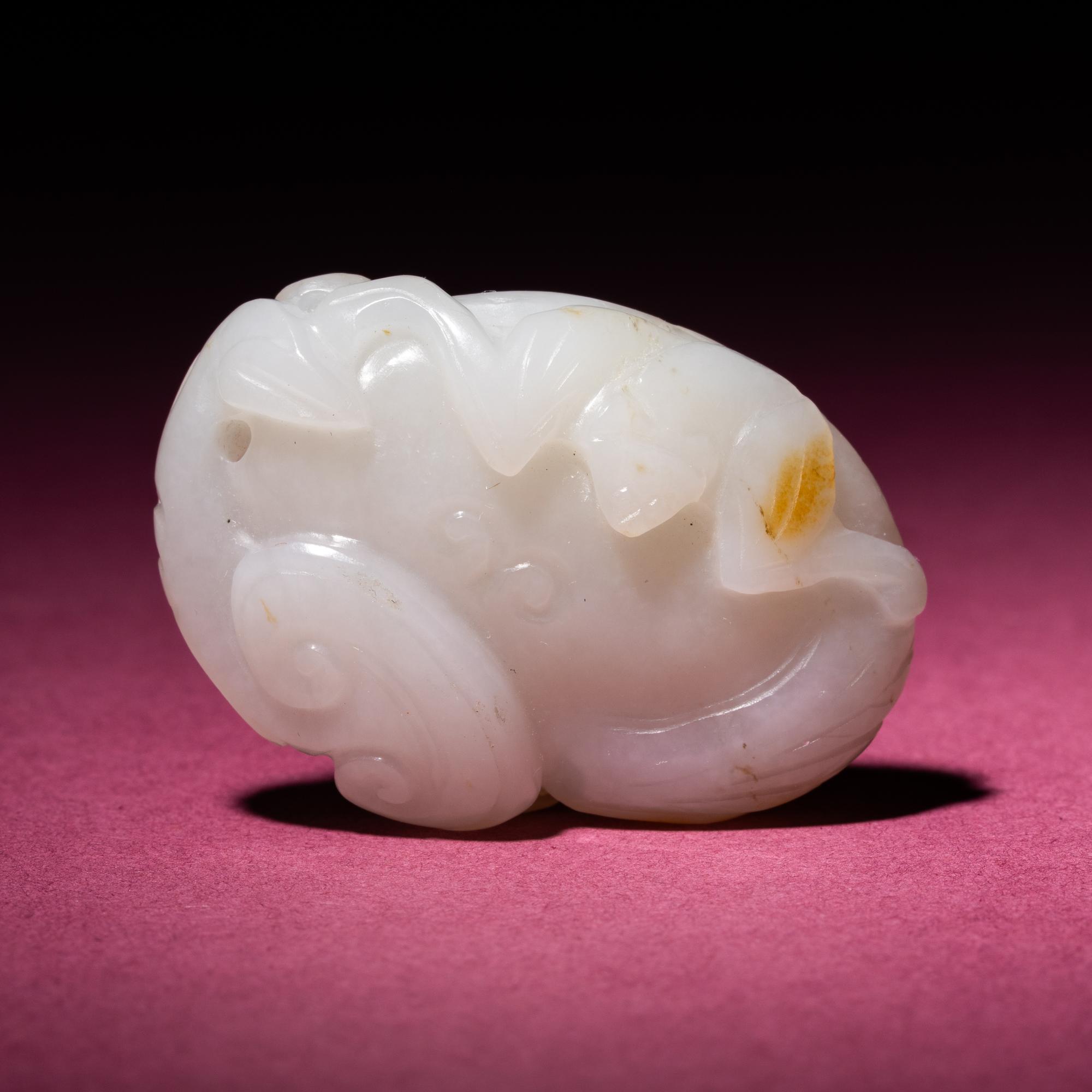 A Small Chinese Russet and Jade 'Bat and Lingzhi' Carving, 18th/19th Century — 清中期 白玉留皮靈芝福壽佩