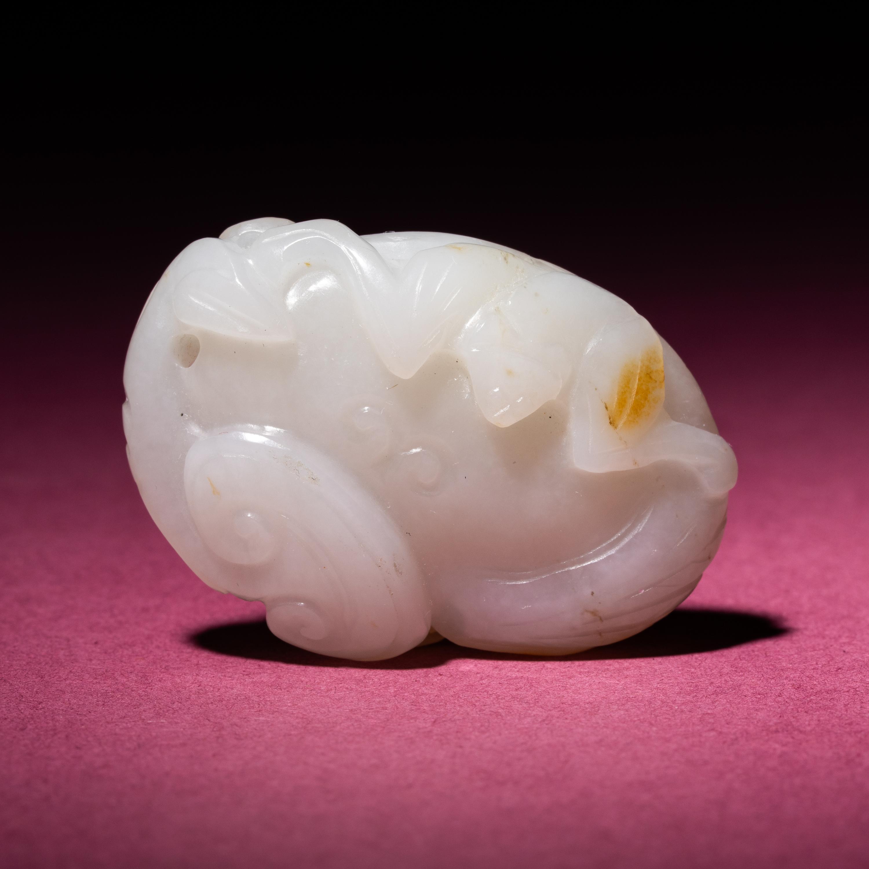 A Small Chinese Russet and Jade 'Bat and Lingzhi' Carving, 18th/19th Century — 清中期 白玉留皮靈芝福壽佩