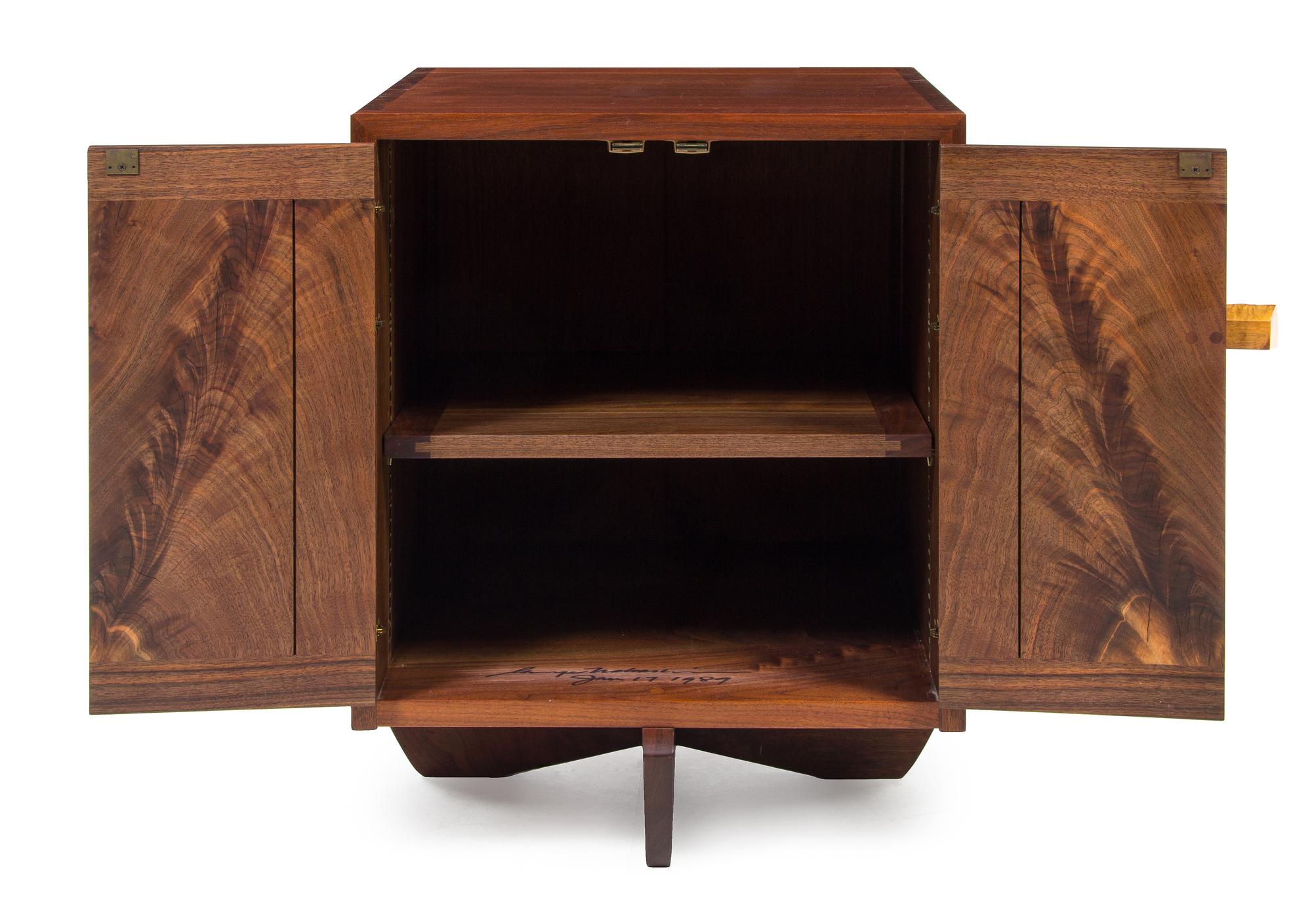 George Nakashima, (Japanese/American, 1905-1990), a rare pair of Kornblut cabinets, executed in a custom size with finished backs, 1989