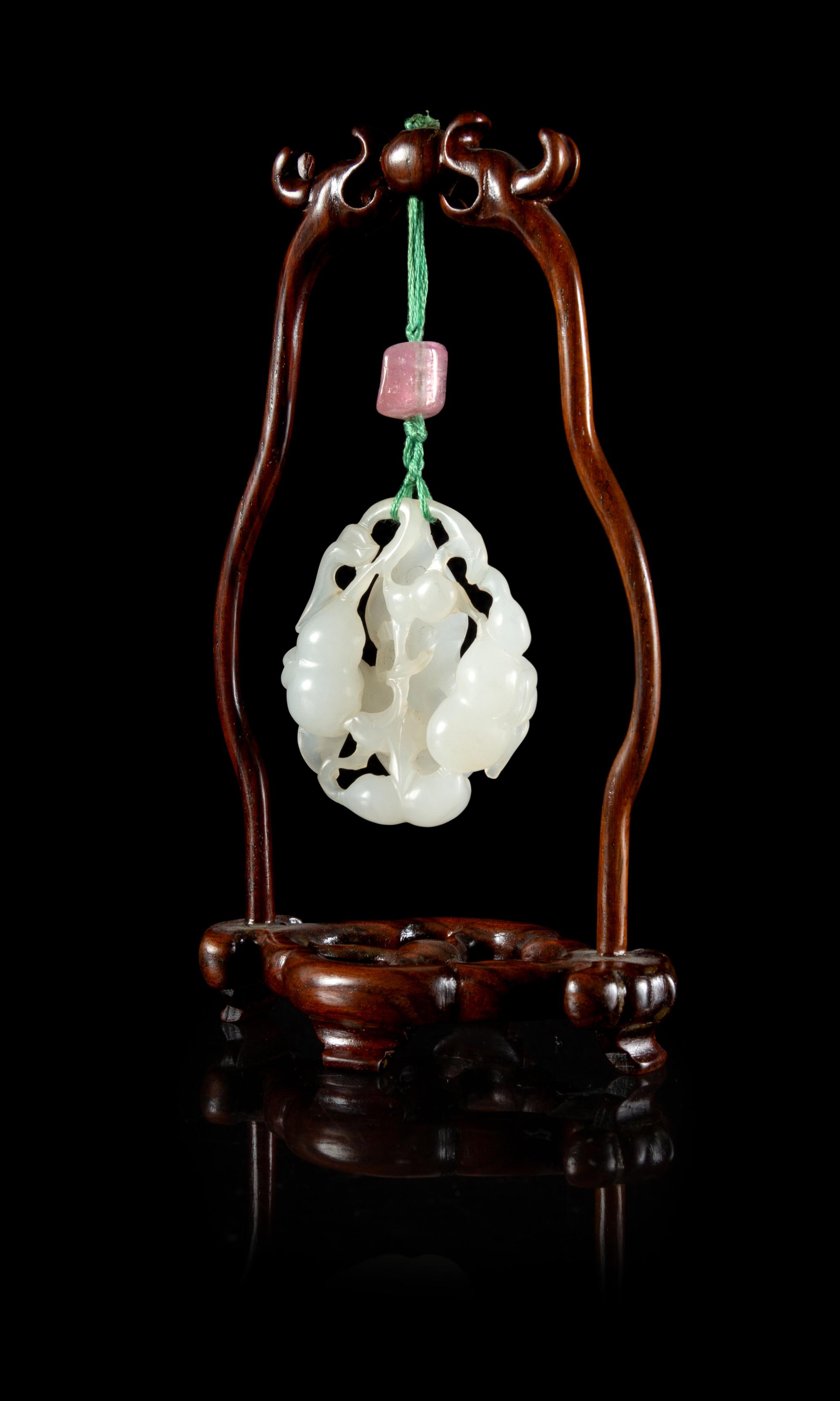 A White Jade 'Gourd' Pendant