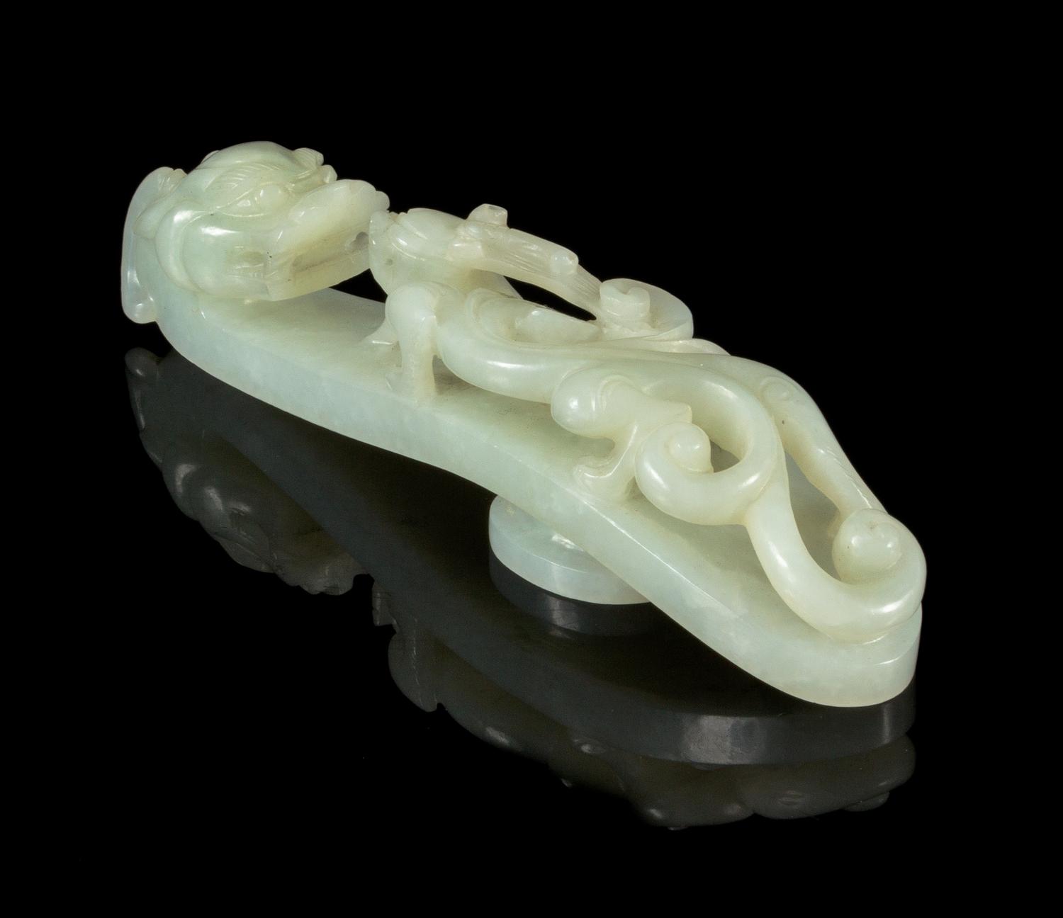 A Carved Jade Belt Hook Length 5 1/2 inches.