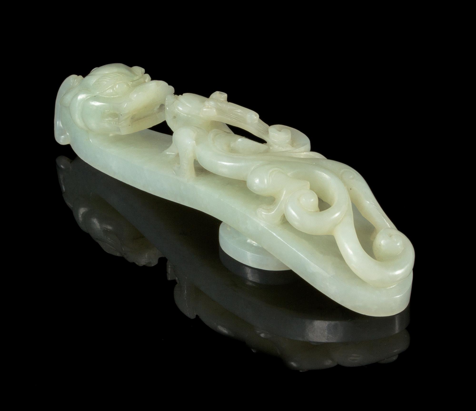 A Carved Jade Belt Hook Length 5 1/2 inches.