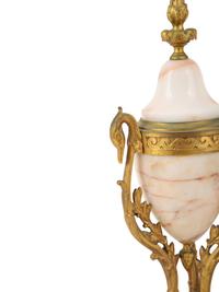 A French Gilt Bronze Mounted Onyx Clock Garniture