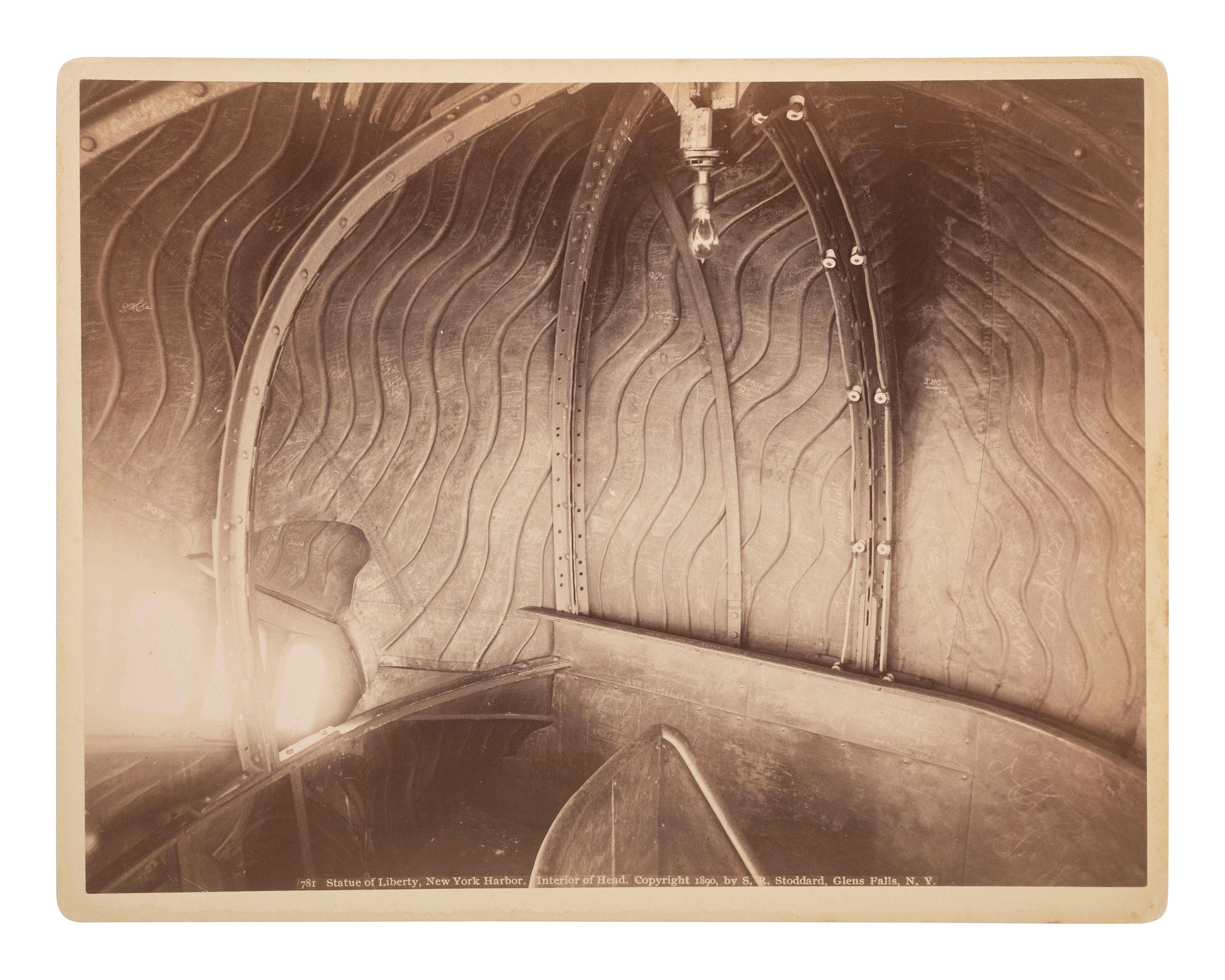 New York -- Statue of Liberty A pair of images related to the Statue of Liberty including an interior view of the head by Seneca Ray Stoddard (1844-1917).