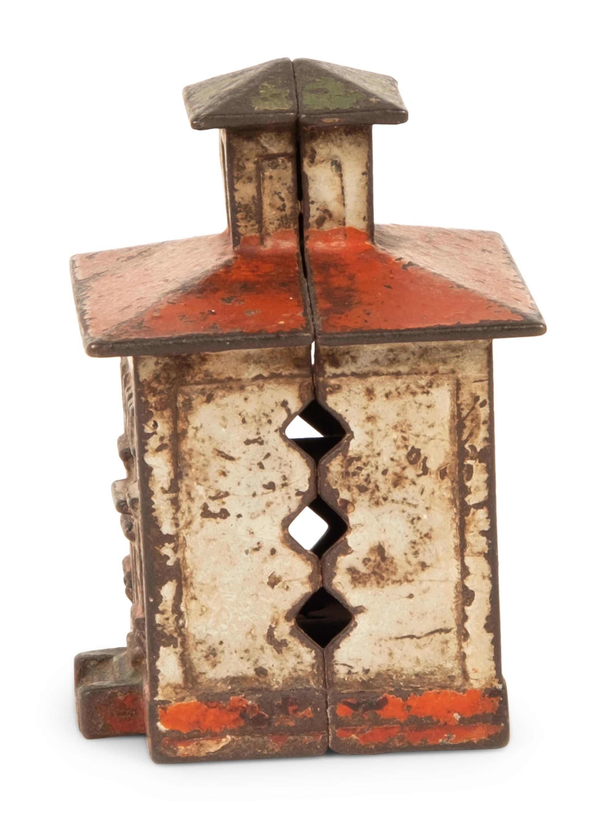 An Old Honesty Cast Iron Indian Cigar Bank, PLUS