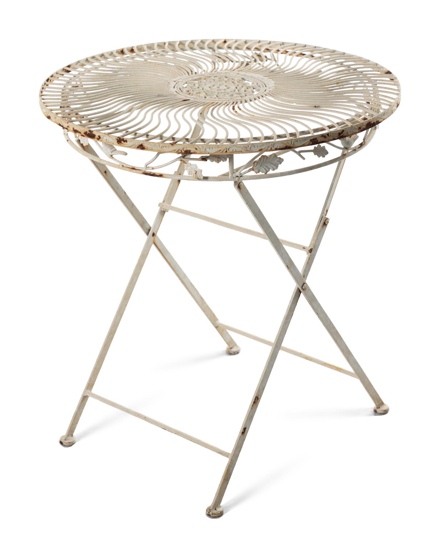 A Painted Cast Iron Garden Table and Two Chairs