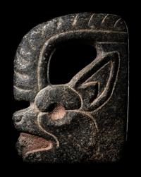 A Maya Stone Hacha in the Form of a Jaguar or Bat