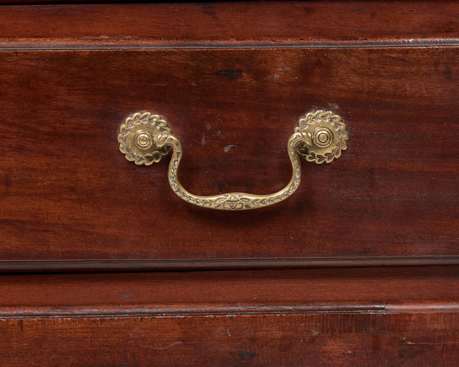 A Chippendale Carved Cherrywood Desk and Bookcase