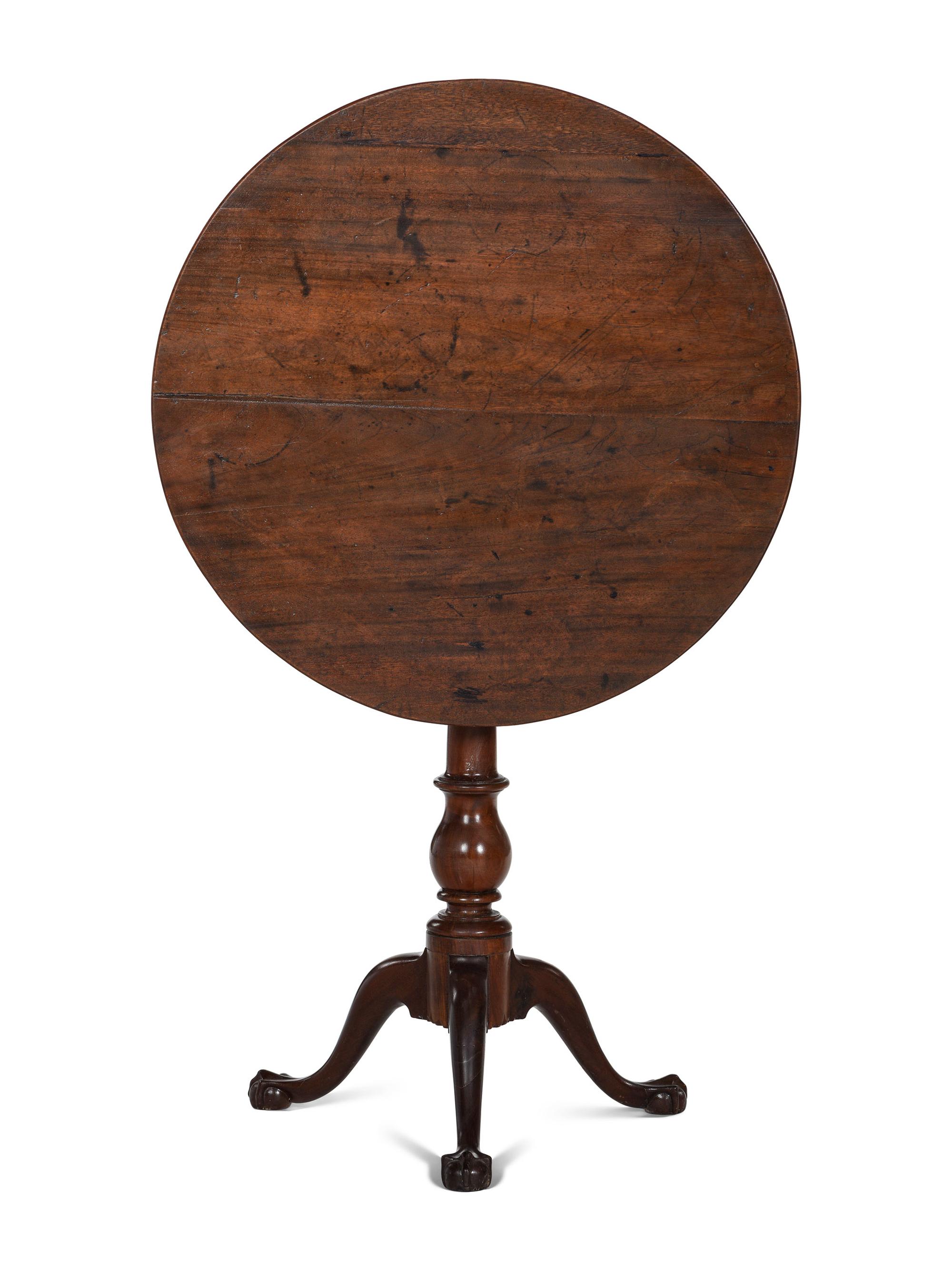 A Chippendale Walnut Claw and Ball Foot Tilt-Top Tea Table