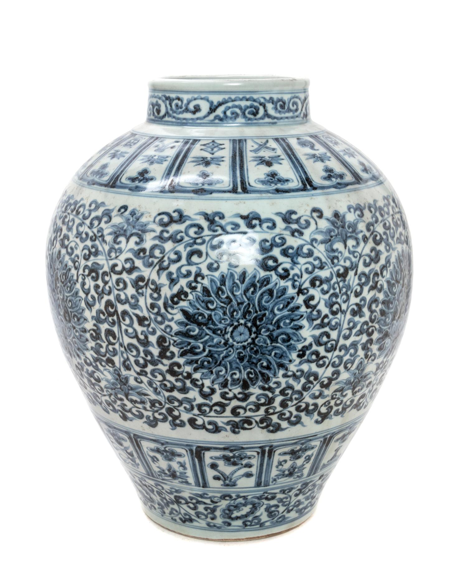 A Chinese Blue and White Porcelain Jar Height 19 inches.