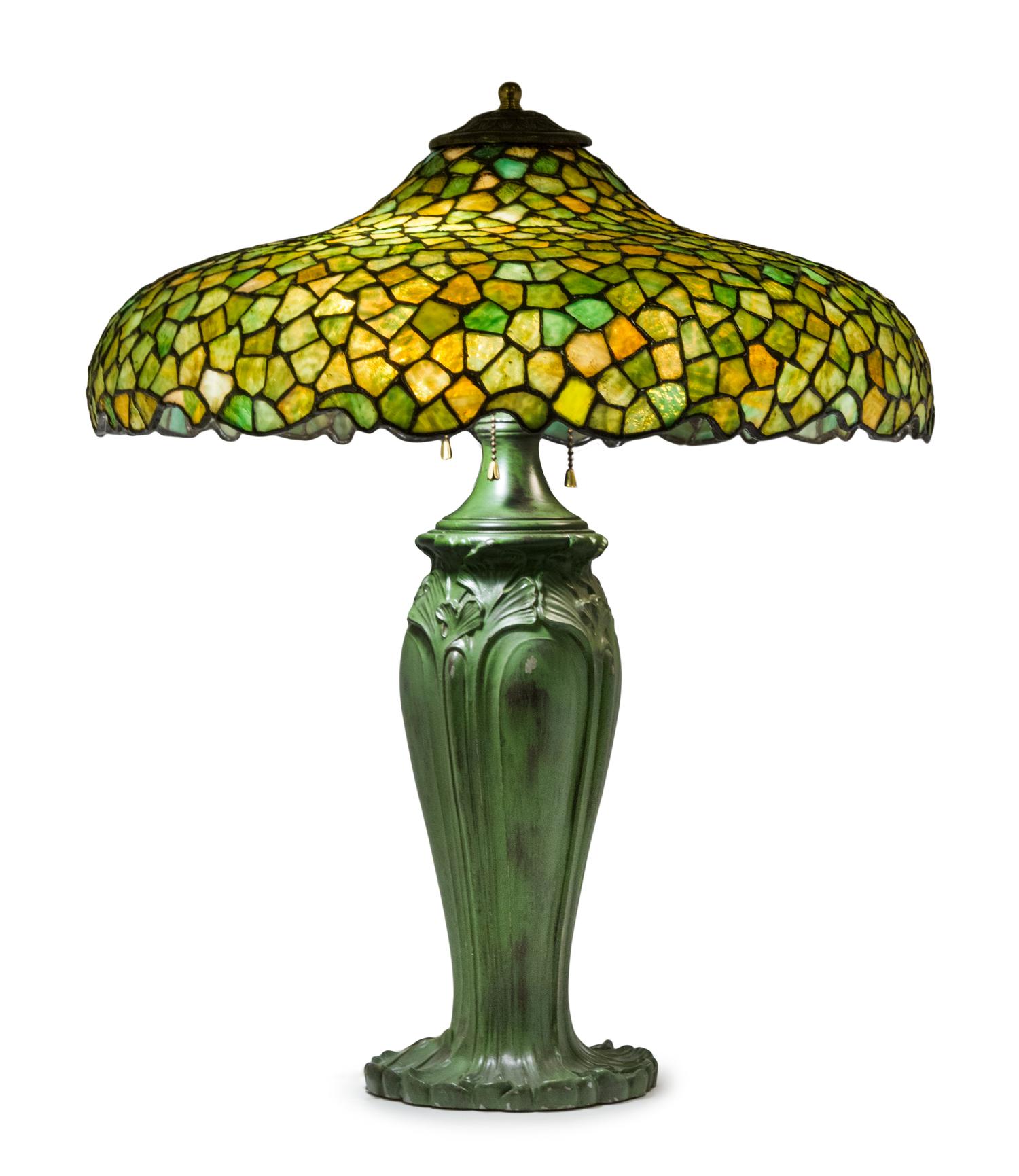 An American Leaded Glass Table Lamp Diameter of shade 21 inches, height overall 25 inches.