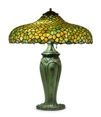 An American Leaded Glass Table Lamp Diameter of shade 21 inches, height overall 25 inches.