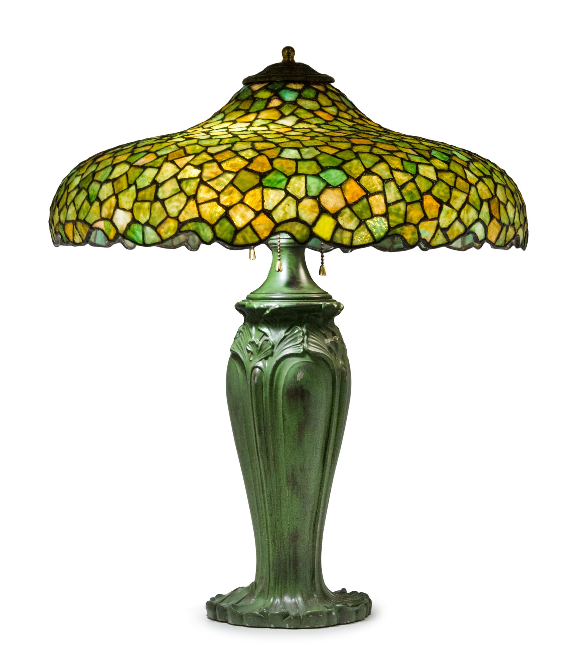 An American Leaded Glass Table Lamp Diameter of shade 21 inches, height overall 25 inches.
