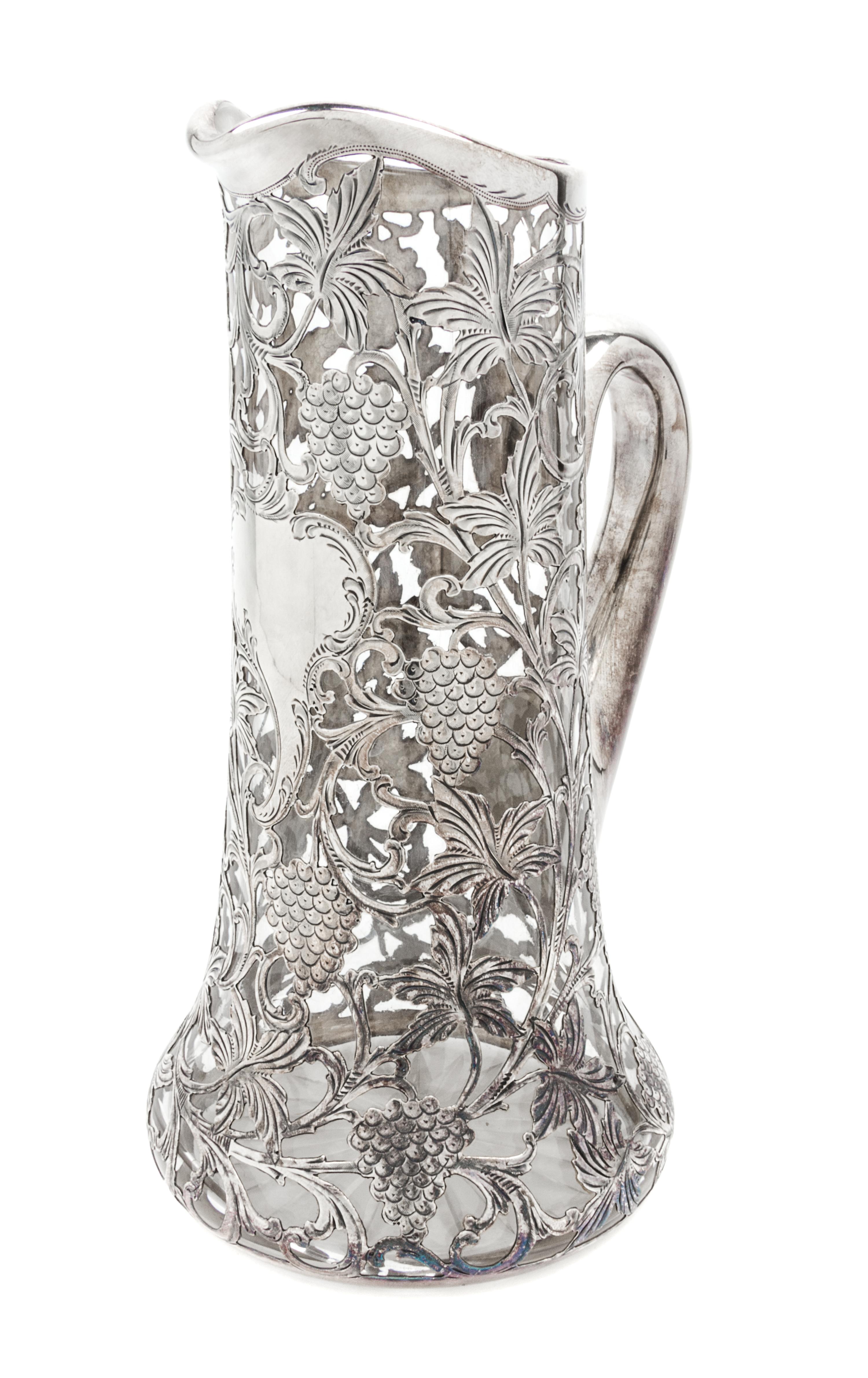 A Silver Overlay Glass Pitcher Height 11 1/4 inches.