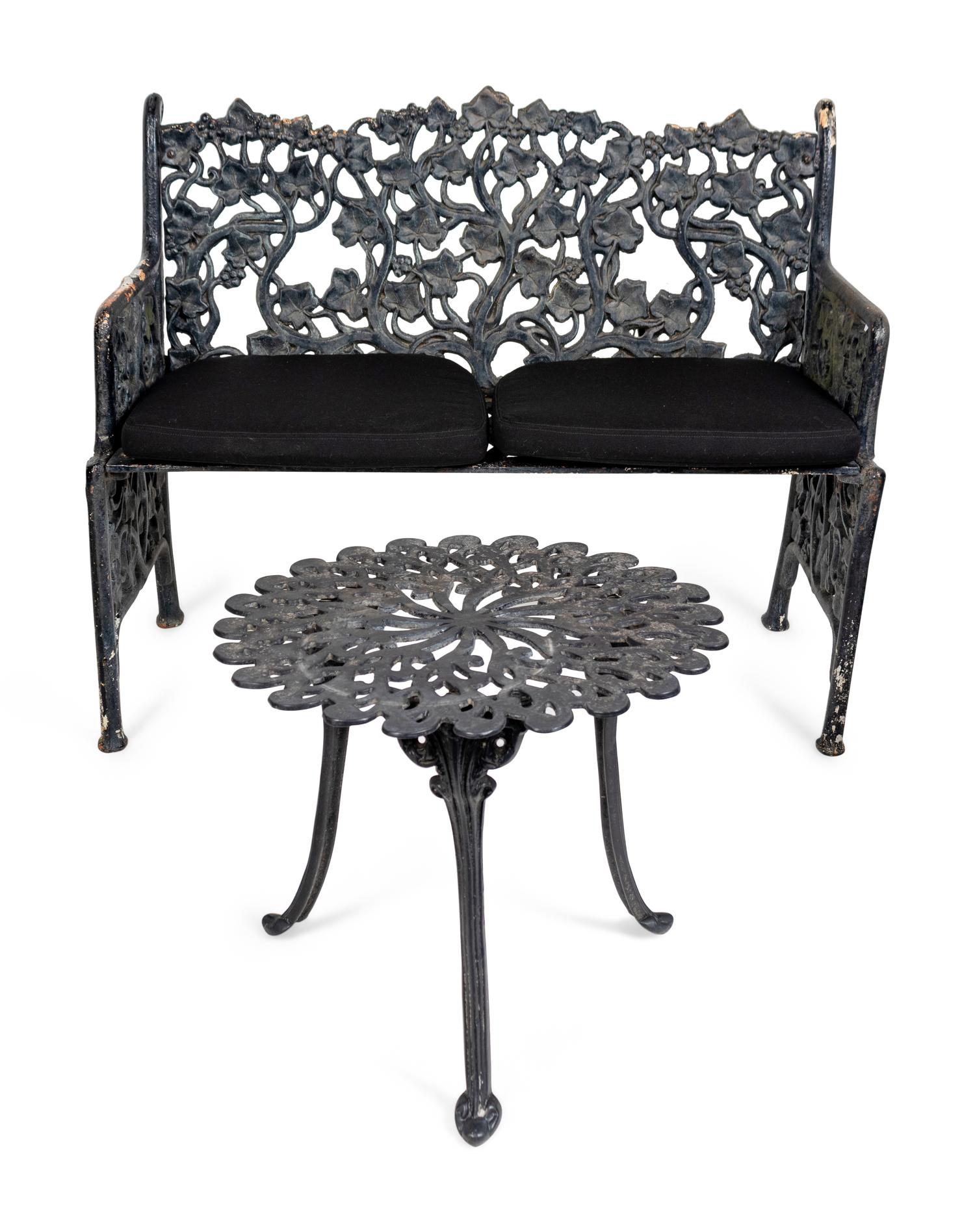 A Suite of Black Painted Metal Garden Furniture