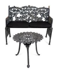 A Suite of Black Painted Metal Garden Furniture