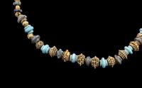 An Western Asiatic Stone Beaded Necklace with Ancient Gold Spacers