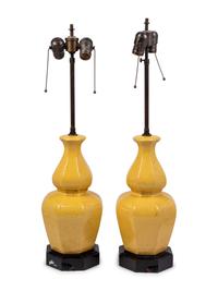 A Pair of Yellow Glazed Pottery Lamps