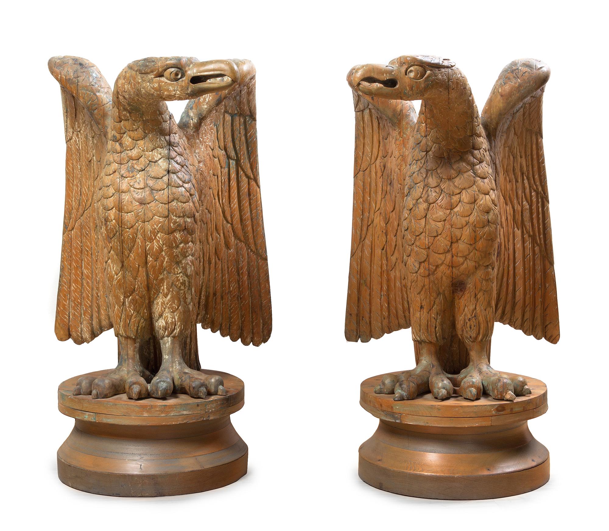 A Pair of American Carved Limewood Eagle Ornaments, Height 35 1/3 inches.