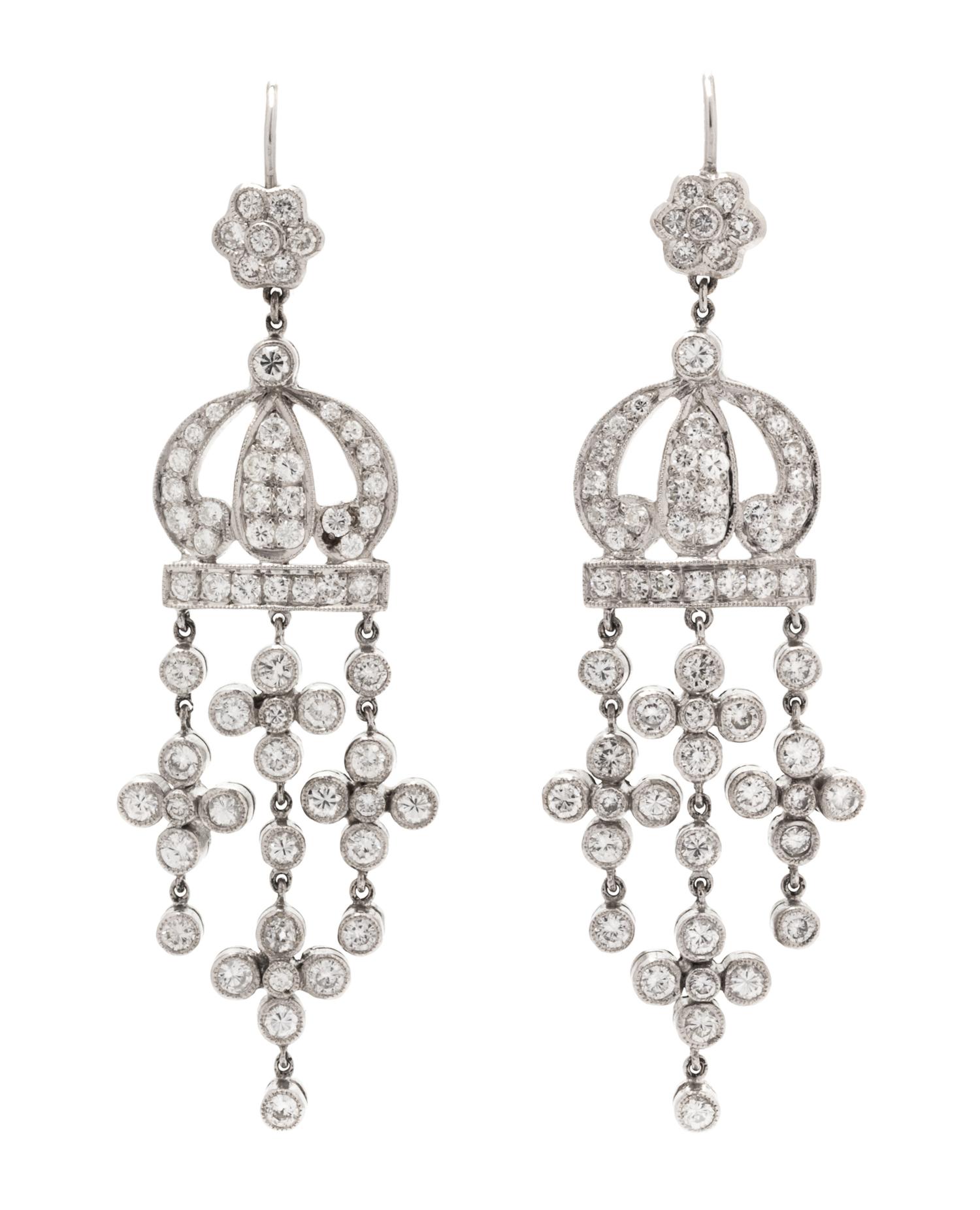 A Pair of 18 Karat Gold and Diamond Dangle Earrings, 7.50 dwts.