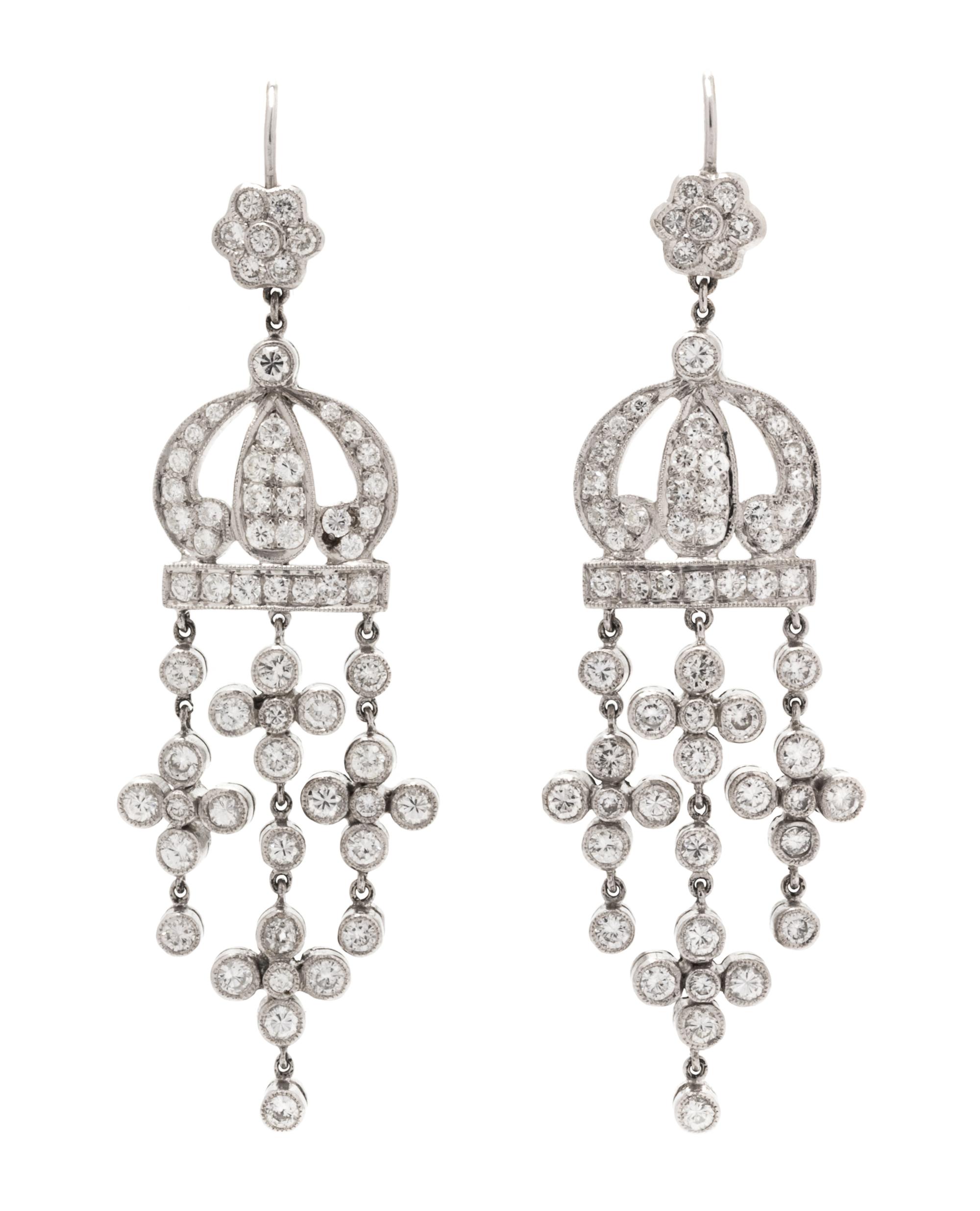 A Pair of 18 Karat Gold and Diamond Dangle Earrings, 7.50 dwts.