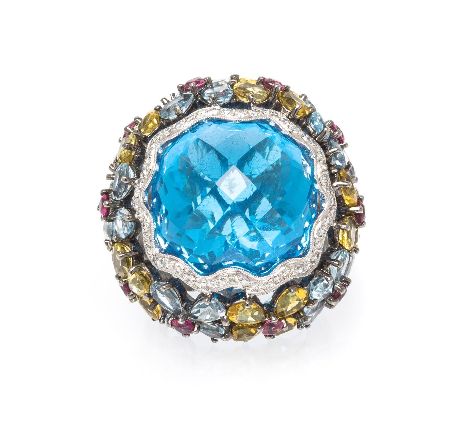 An 18 Karat White Gold and Multi Gem Cocktail Ring, 19.60 dwts.