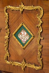 A Louis XV Style Porcelain and Bronze Mounted Tulipwood Veneered Hanging Étagère