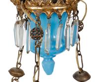 A Gilt Metal Mounted Opaline Glass Six-Light Chandelier