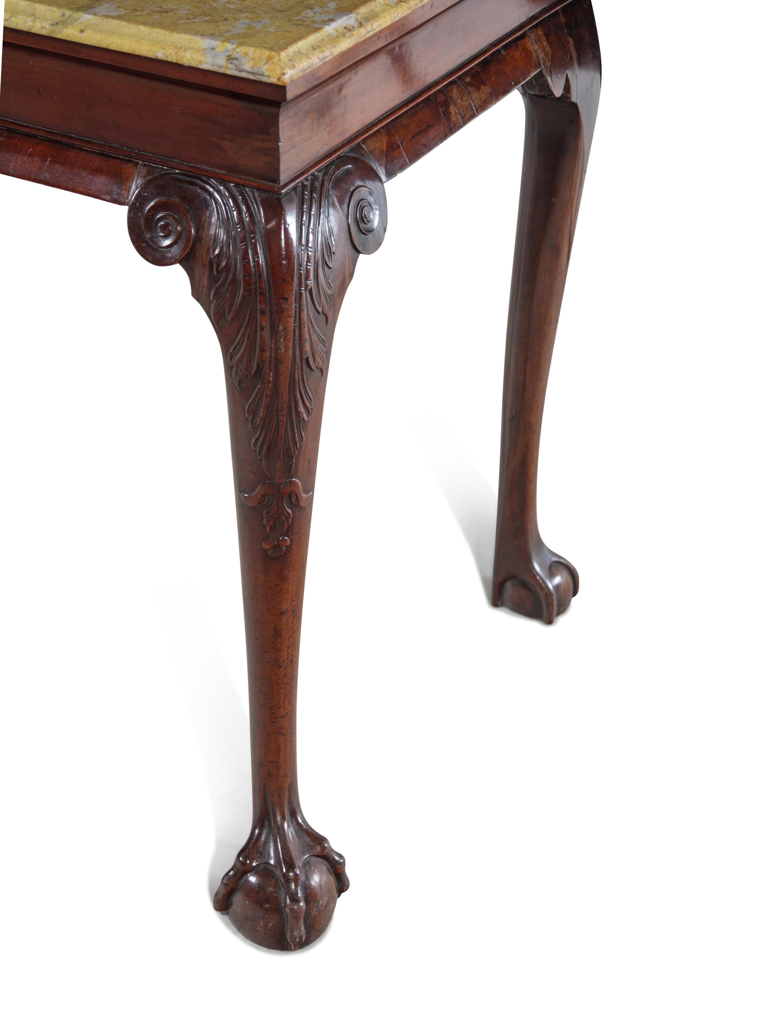 A George II Carved Mahogany Marble-Top Pier Table