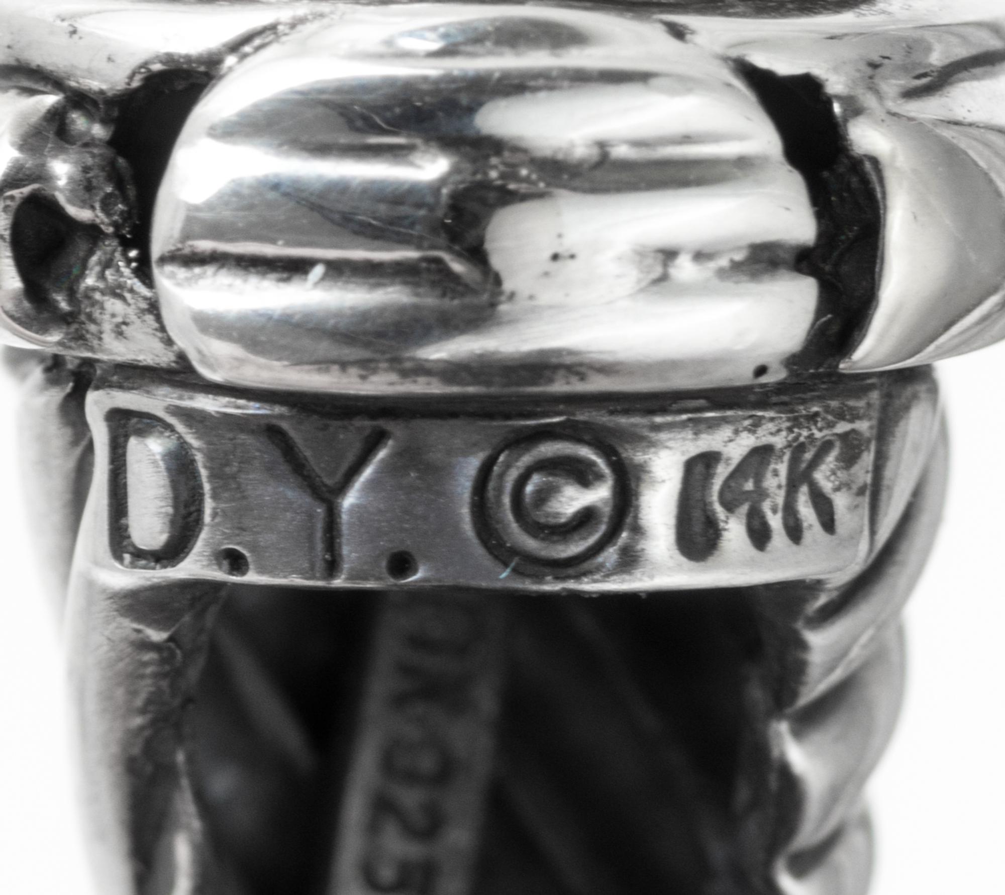 A Pair of Sterling Silver and 14 Karat Yellow Gold 'Thoroughbred' Earclips, David Yurman, 8.70 dwts.