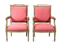 A Pair of Louis XVI Style Carved and Painted Fauteuils Height 38 1/2 x width 24 x depth 21 inches. — 19TH CENTURY