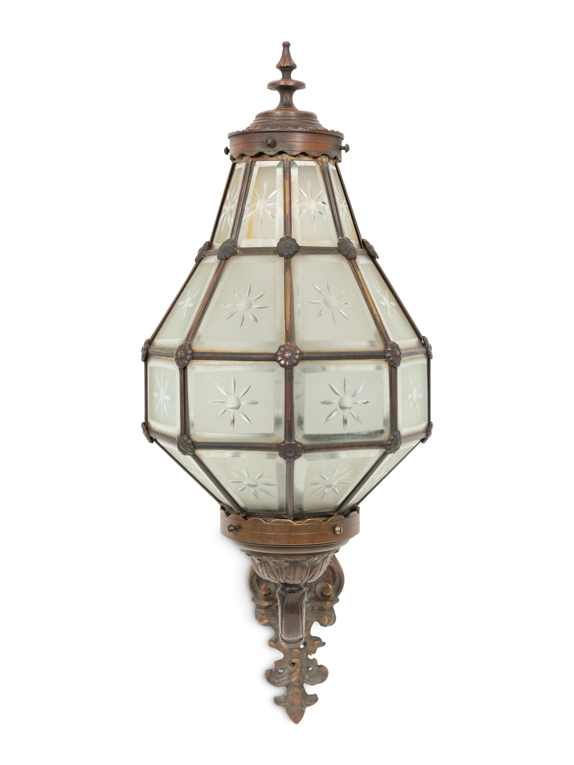 A Bronze and Glass Wall Sconce