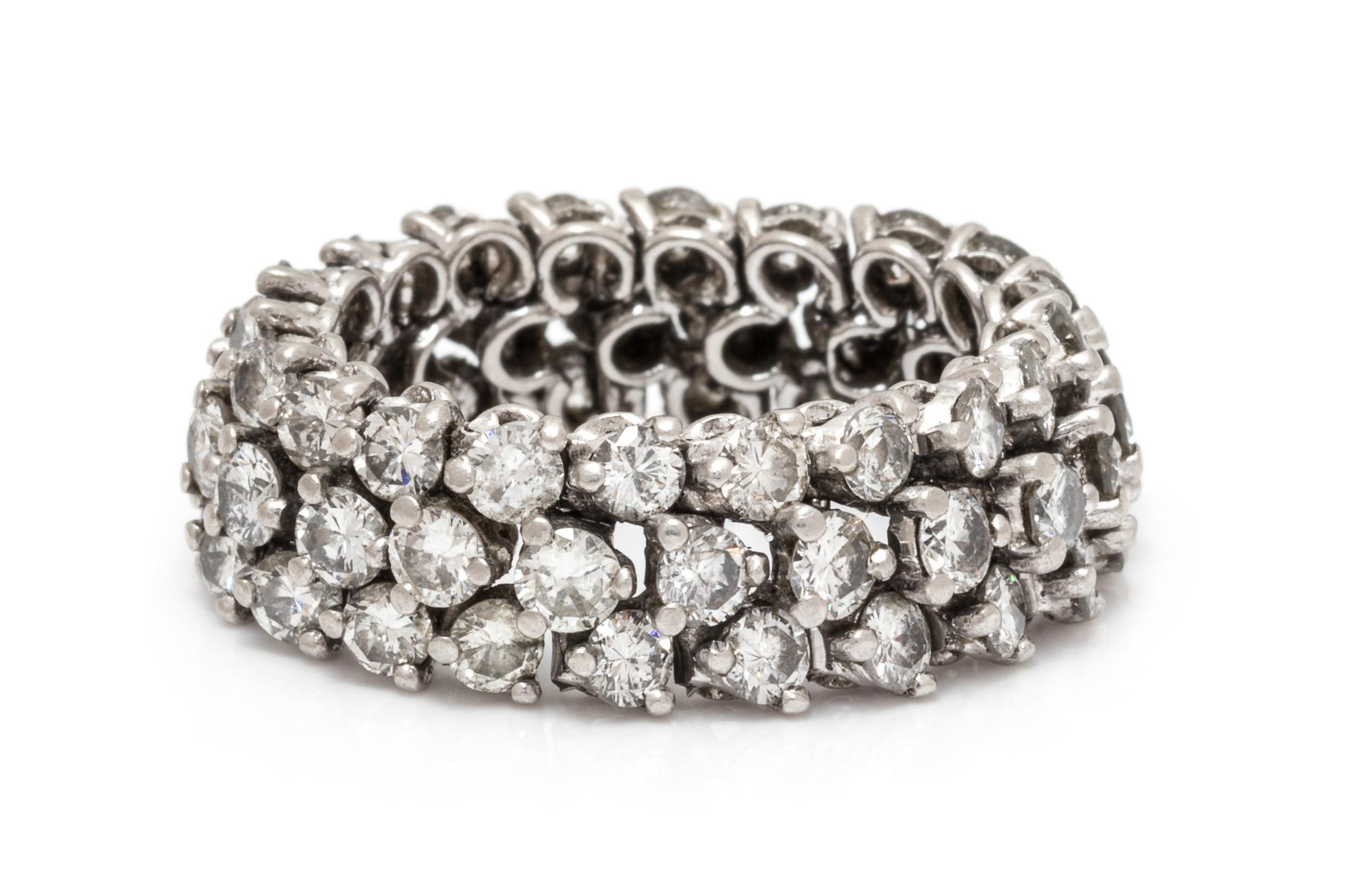 A Platinum and Diamond Flexible Band Ring, 5.77 dwts.