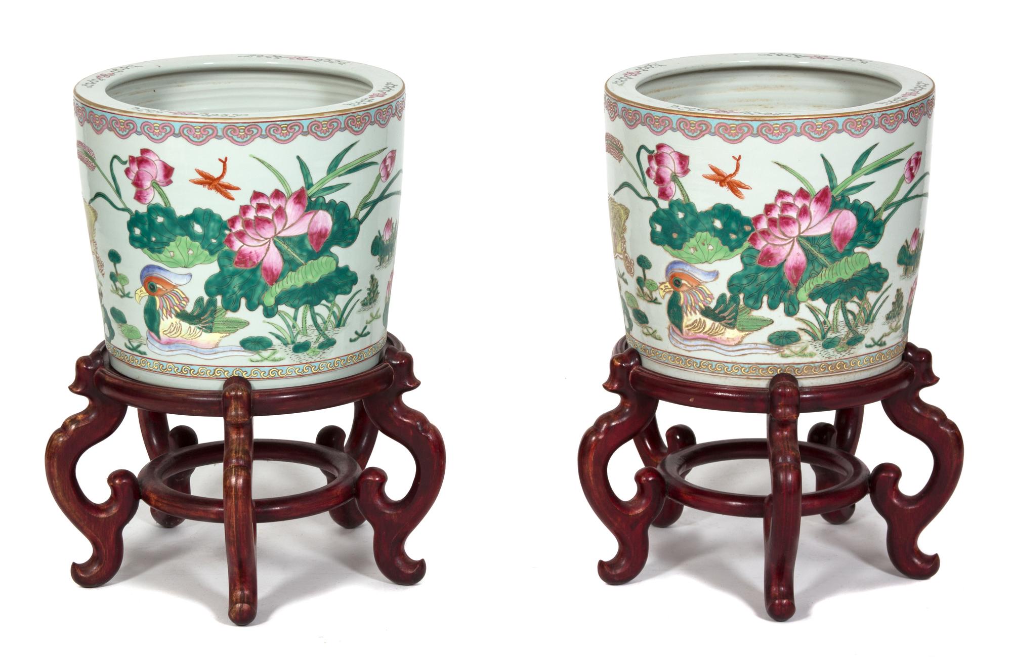 A Pair of Chinese Export Famille Rose Porcelain Jardinieres Height 12 x diameter 14 1/4 inches.