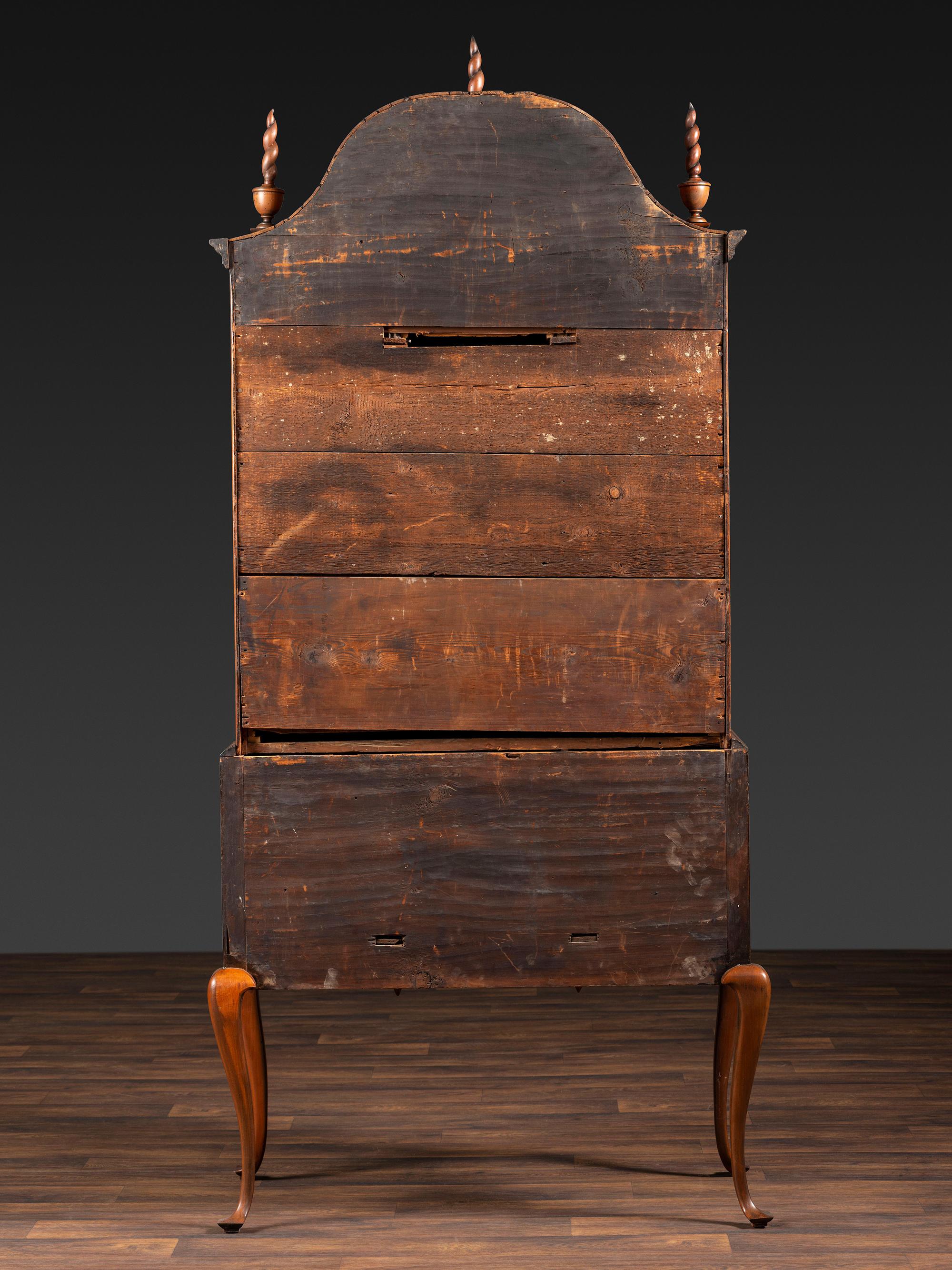 A Queen Anne Fan-Carved Cherrywood Bonnet Top High Chest