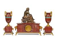 A French Bronze, Marble and Champlevé Clock Garniture