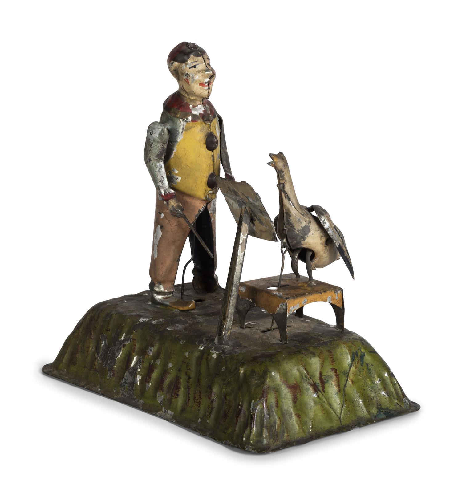 A Gunthermann Hand-Painted Tin and Paper Windup Toy